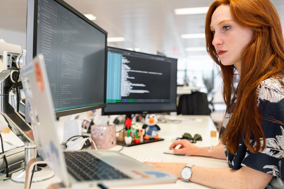 woman working at computer workstation